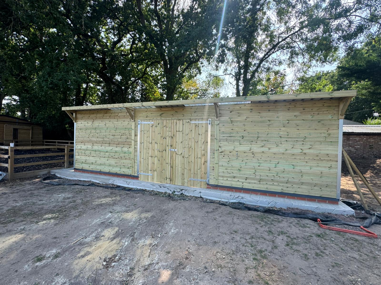 12x36 timber workshop exterior with double doors