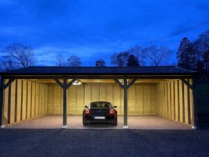 carport 6mx9m with lights on and car inside