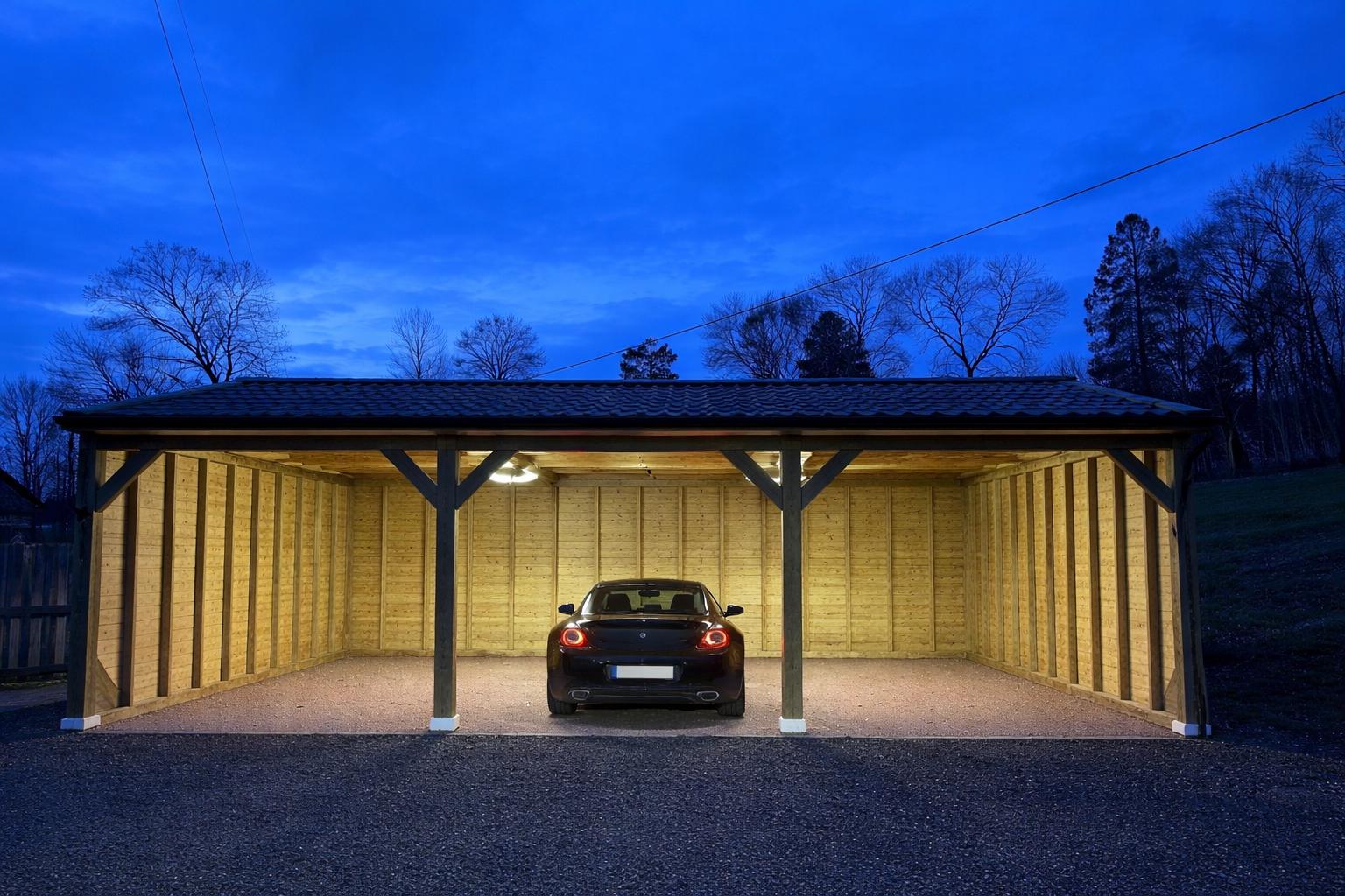 carport 6mx9m with lights on and car inside