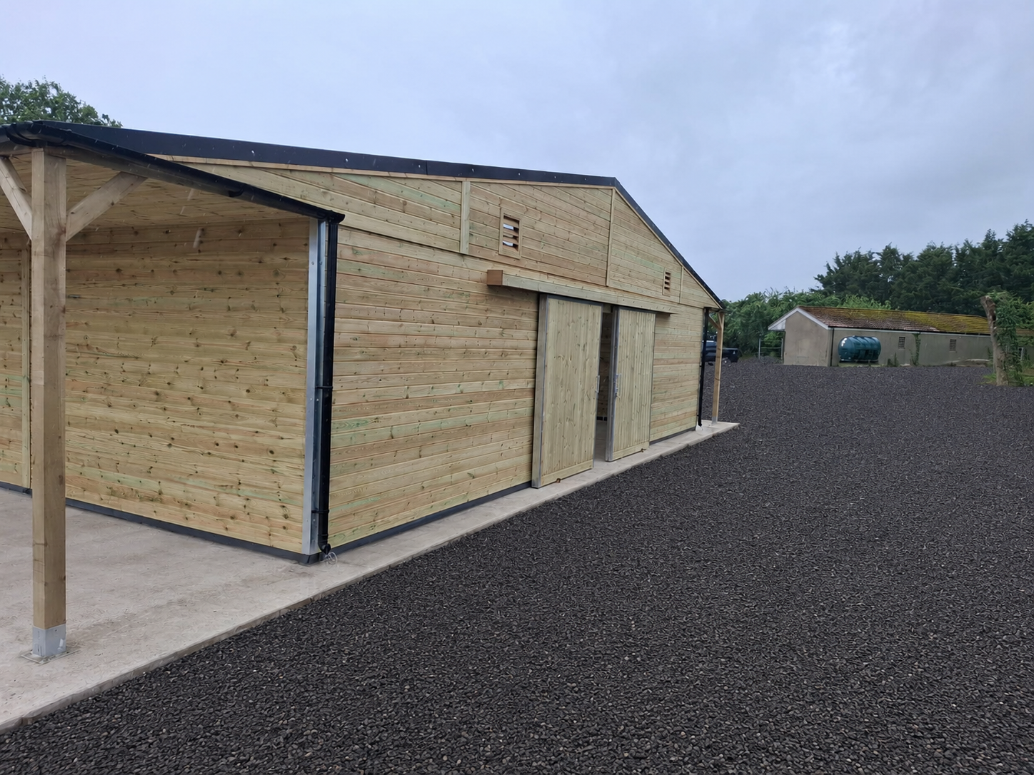 36x60 open American barn with extended 6ft overhangs