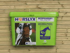Horslyx Respiratory 5kg against a timber stable building